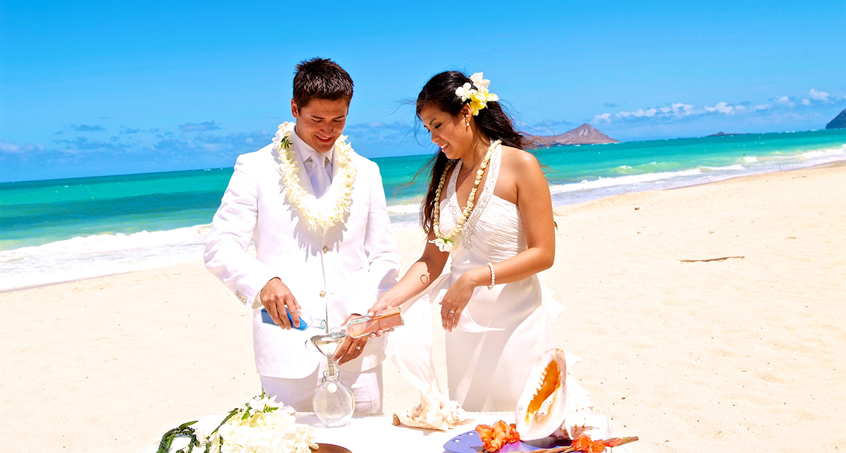 during their ceremony on oahu the wedding couple did the unity sand ceremony